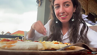 Enjoying A Slice Of Pizza With A Creamy Topping On My Pretty Face At An Outdoor Cafe