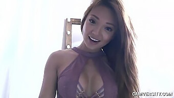 Asian Beauty Indulges In Pleasure With Dildo On Webcam