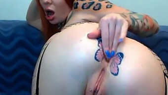 Tattooed Redhead Shows Off Her Butterfly Tattoos On Webcam